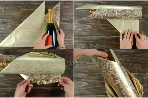 Passaggi per come incartare una bottiglia di vino con carta dorata e fiocchi di neve. La bottiglia viene avvolta e piegata con cura.